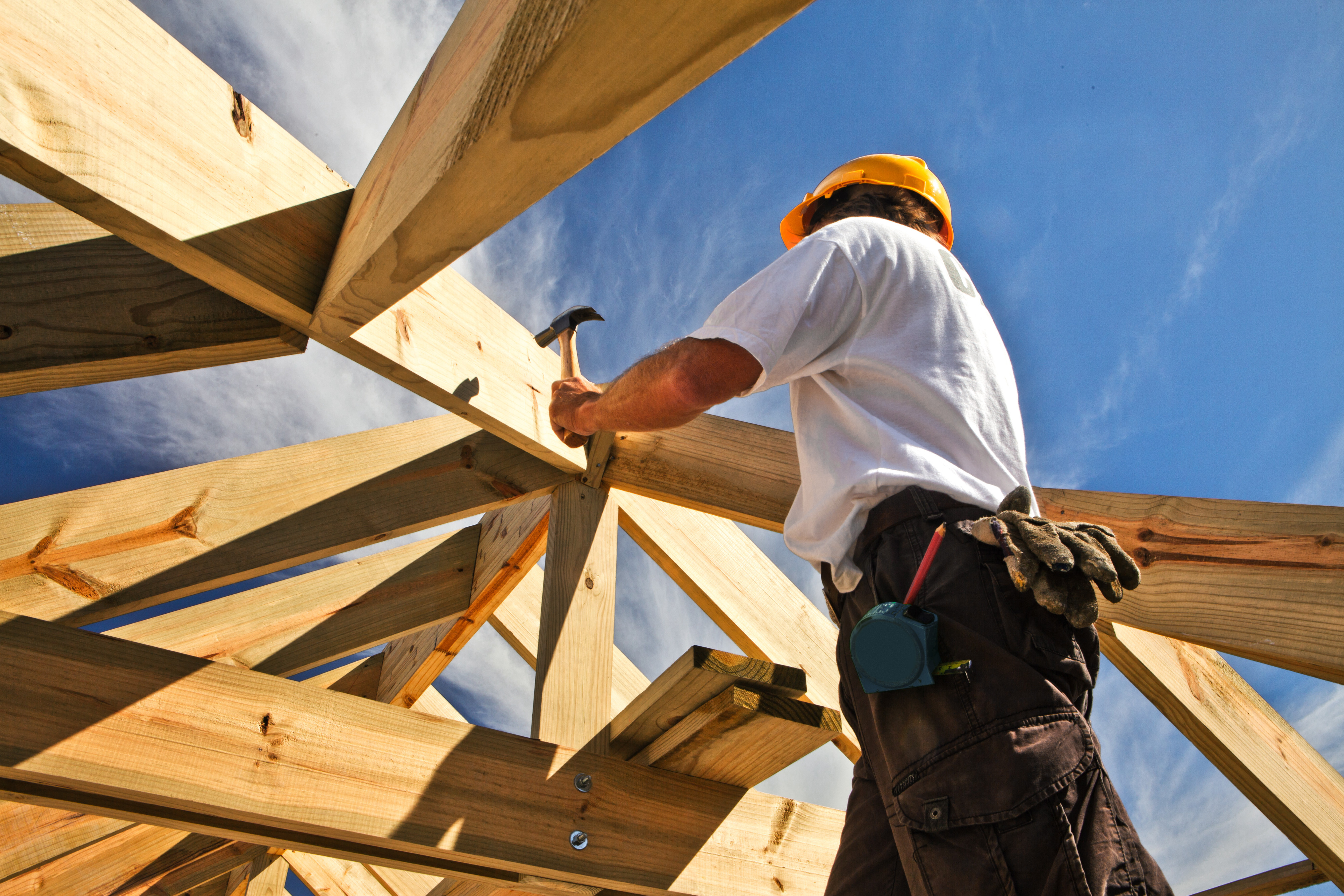 Constructionworker fixing a roof